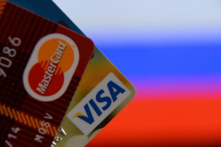 Госдума обяжет банки работать через Национальную систему платёжных карт