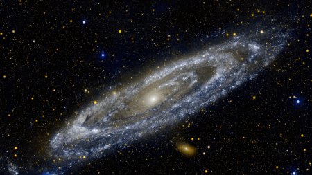 Две галактики в форме арахиса смог снять телескоп Hubble